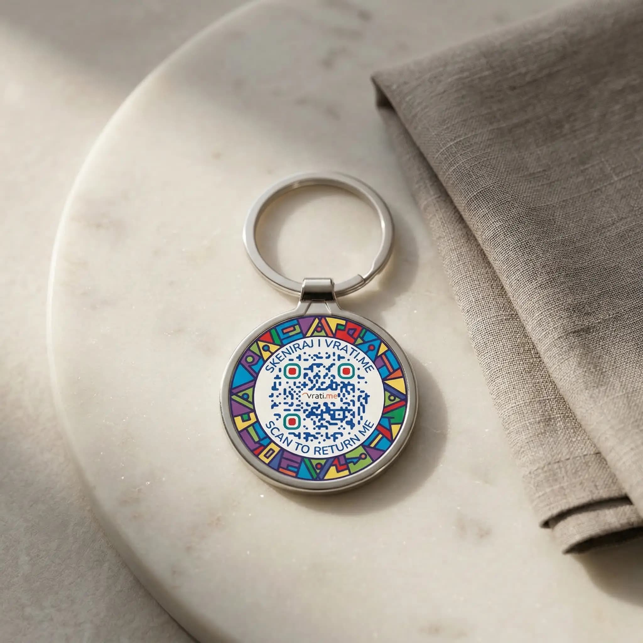 Okrugli privezak za ključeve - 7